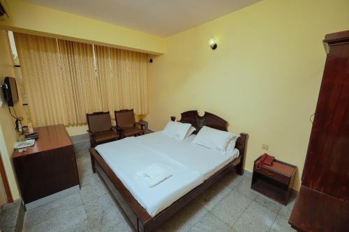 Postel nebo postele na pokoji v ubytování Hotel oneiro