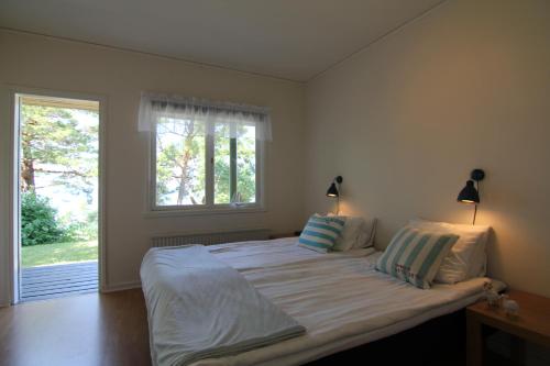 Cama o camas de una habitación en Snäck Annex