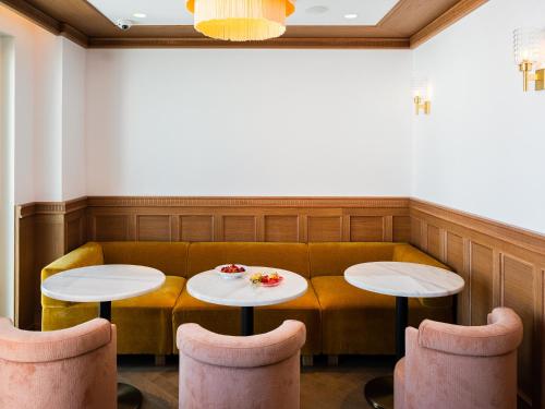 a restaurant with two tables and two chairs at The Standard, Ibiza in Ibiza Town