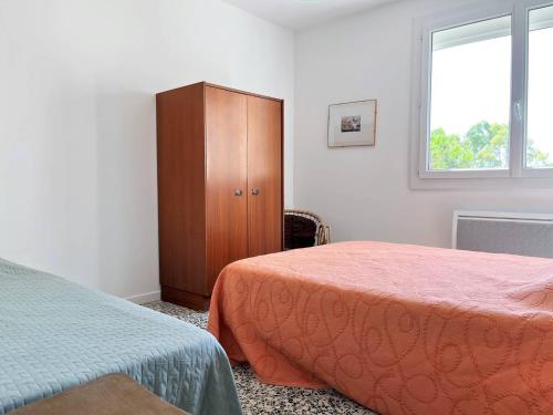 Posteľ alebo postele v izbe v ubytovaní Appartement Le Lavandou, 3 pièces, 6 personnes - FR-1-251-355