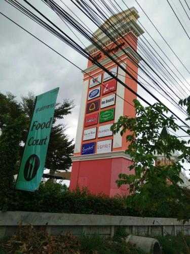 a food court sign in front of a building at Deluxe 1bedroom Hua Hin Seaview Beachfront Project in Ban Bo Fai