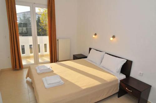 Katil atau katil-katil dalam bilik di Apartments Eleftheria