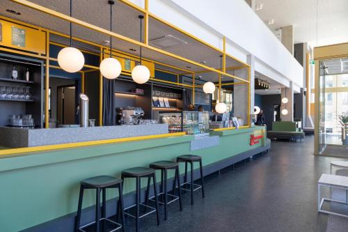 Restaurant ou autre lieu de restauration dans l'établissement MEININGER Hotel Bremen Hauptbahnhof