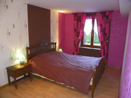 Cama o camas de una habitación en gite chez Maise