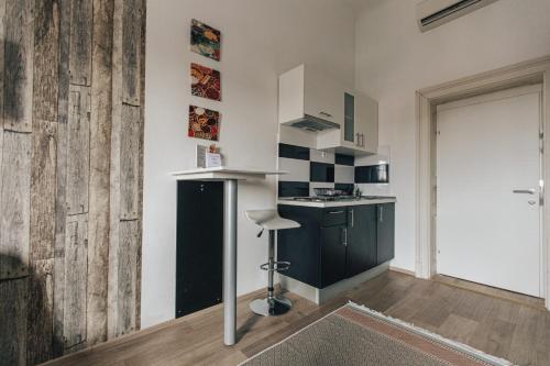 Cucina o angolo cottura di Apartments and Rooms Palmers Lodge