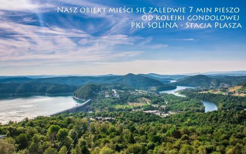 a view of the allegheny river from the top of a mountain at Noclegi Fregata - Pokoje Gościnne w Solinie 661-459-339 in Solina