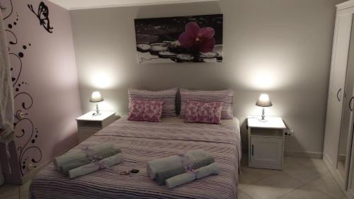 Кровать или кровати в номере B&B Villa S Anna Hospitality Solutions