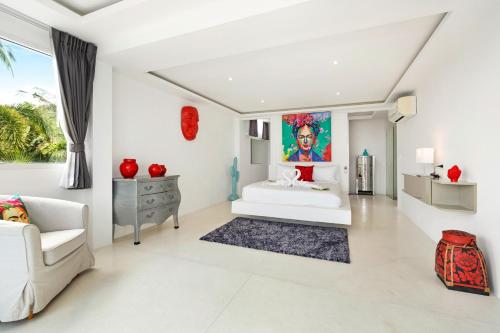 Ένα ή περισσότερα κρεβάτια σε δωμάτιο στο Villa SAYAM, vue mer panoramique & piscine infinity privée à Bophut