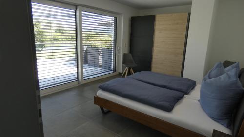 Postel nebo postele na pokoji v ubytování Moselufer Apartments