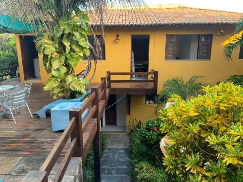 Balkón nebo terasa v ubytování Excelente casa na Praia do Coqueiro com 4 suítes a 100m da praia