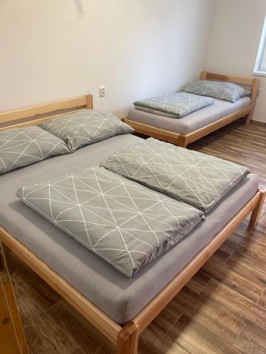 Postel nebo postele na pokoji v ubytování Ubytování Šmudla