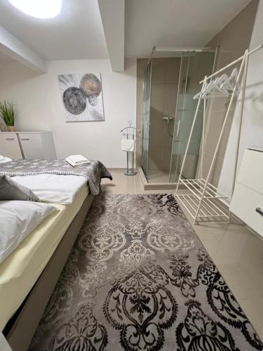 Кровать или кровати в номере Apartmany Rosna