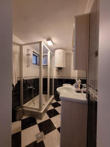 Ванная комната в Villa WERONA Njivice