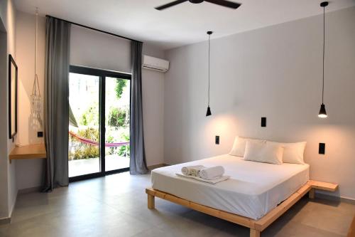 Cama o camas de una habitación en Galini Studios & Apartments