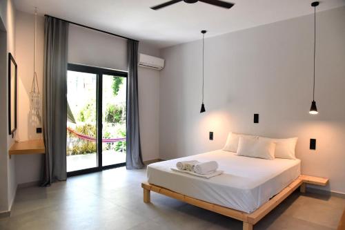 Posteľ alebo postele v izbe v ubytovaní Galini Studios & Apartments-Adults only