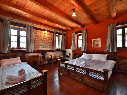 Ένα ή περισσότερα κρεβάτια σε δωμάτιο στο Agriogido - Rupicapra Villas