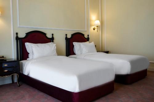 Cama o camas de una habitación en ANIM Boutique Hotel