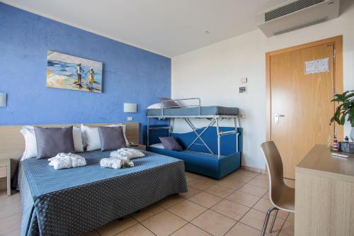 Postel nebo postele na pokoji v ubytování Hotel Souvenir - Koolibry Hotels