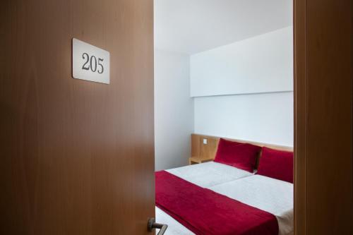 Кровать или кровати в номере Casa Avé Maria
