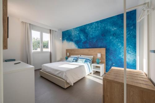 A bed or beds in a room at Venti di Laguna
