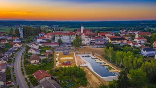 an aerial view of a small town with a lake at Studio Apartment Lea in Čazma