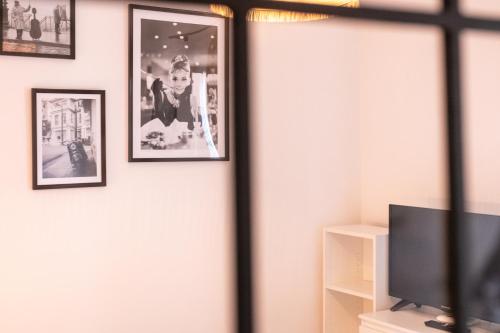 Μια τηλεόραση ή/και κέντρο ψυχαγωγίας στο Cosy Apparts Brive