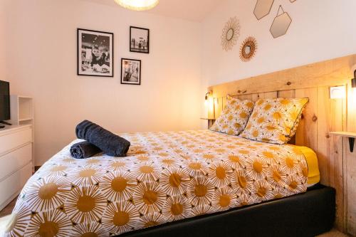 Ένα ή περισσότερα κρεβάτια σε δωμάτιο στο Cosy Apparts Brive