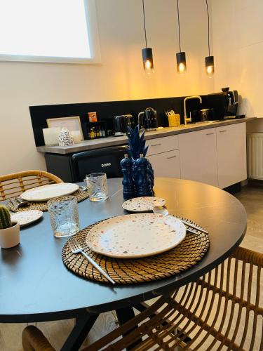 Η κουζίνα ή μικρή κουζίνα στο Quinze suites et wellness de luxe