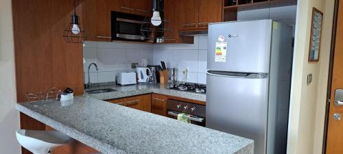 Una cocina o kitchenette en NM ApartHotel Castellon