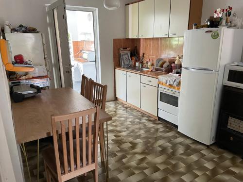 Kuchyň nebo kuchyňský kout v ubytování Adria MN Apartment