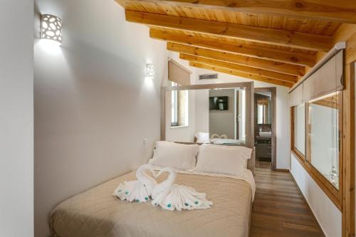 Postel nebo postele na pokoji v ubytování Villa Potami Nikos by Villa Plus