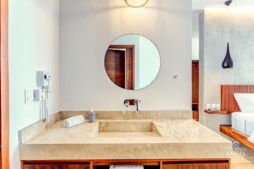 Fotografie z fotogalerie ubytování Chic Condotel with Roof Pool 10-Min Walk to Beach v destinaci Playa del Carmen