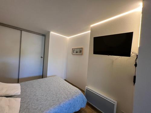 Postel nebo postele na pokoji v ubytování Résidence Aramis