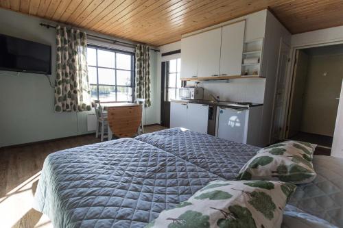 Kuchyň nebo kuchyňský kout v ubytování Resort Naaranlahti