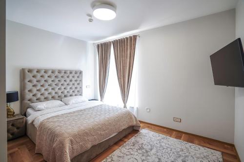 Кровать или кровати в номере Exclusive OldNew apartments in city center