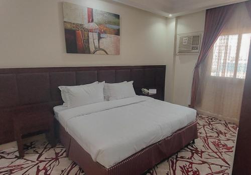 Кровать или кровати в номере فندق ربوة الصفوة Rabwah Al Safwa Hotel 7