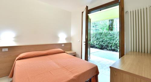 Ένα ή περισσότερα κρεβάτια σε δωμάτιο στο La Villa Elisabeth