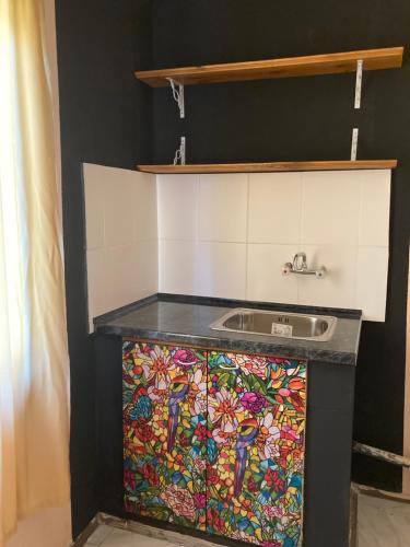 a kitchen with a sink and a counter top at Морска База Венера in Tsarevo