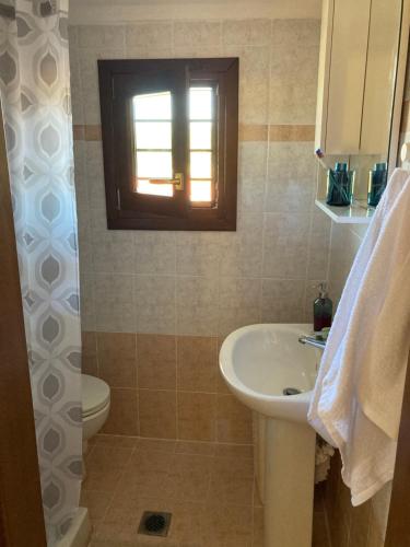 Kúpeľňa v ubytovaní Nikiti Seaview Apartment