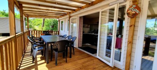 Photo de la galerie de l'établissement Mobil home 3 CH 2 SDB, à Saint-Julien-en-Born