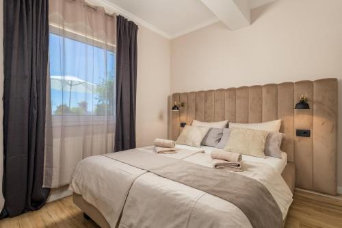 Krevet ili kreveti u jedinici u objektu Apartments Villa Chiara Opatija