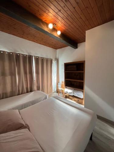 Ένα ή περισσότερα κρεβάτια σε δωμάτιο στο Envalira Vacances - Etoile duplex ideal familia con vista a pistas