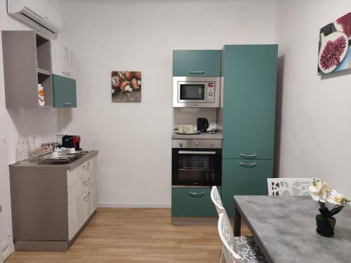 Кухня или мини-кухня в ETRA Casa Vacanza
