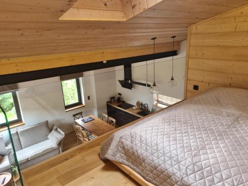 Posteľ alebo postele v izbe v ubytovaní Apartamenty u Kołodzieja