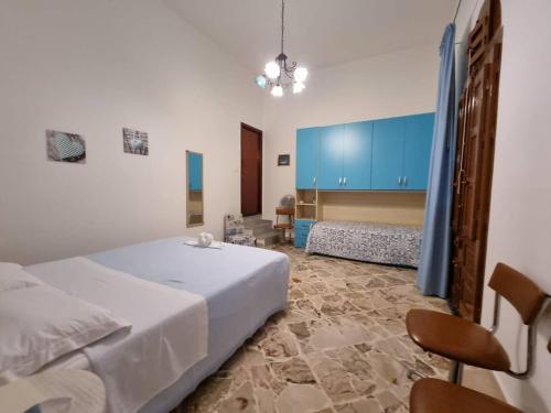 A bed or beds in a room at NARDINA HOUSE