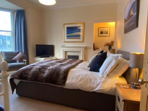 Katil atau katil-katil dalam bilik di Cranford Guest House