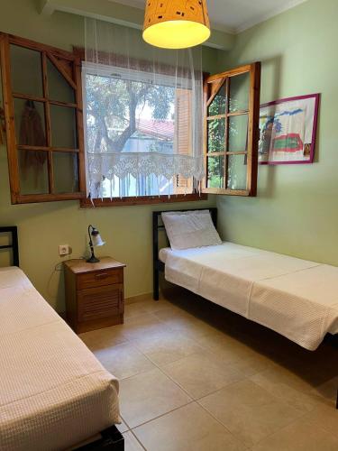 Ένα ή περισσότερα κρεβάτια σε δωμάτιο στο Evak Chalet