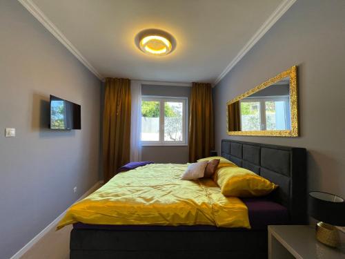Postel nebo postele na pokoji v ubytování Lux Nanea Apartment