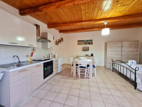 Kuchyň nebo kuchyňský kout v ubytování Casa Vacanza Delfino Azzurro - Noto Marina -
