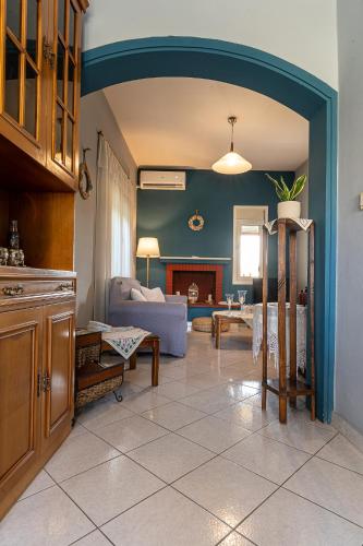 a living room with a couch and a table at Casa Francesca in Vrahati